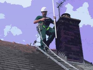 Fitter installing a tv aerial
